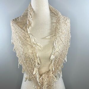 VEOND lace ivory scarf/wrap with leaf tassels adorning the edge
